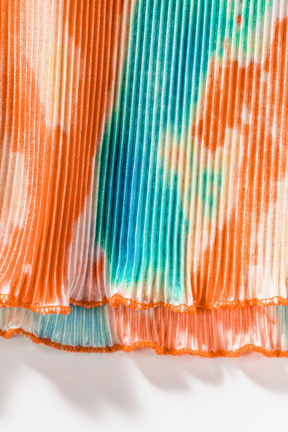 Multicolor Bohemian Tie Dye Pleated Wide Leg JumpsuitMaterial:100%Polyester
•Made of soft and flowy fabric for comfort and movement.
•Features a pleated design for a flattering fit.
•Wide leg c