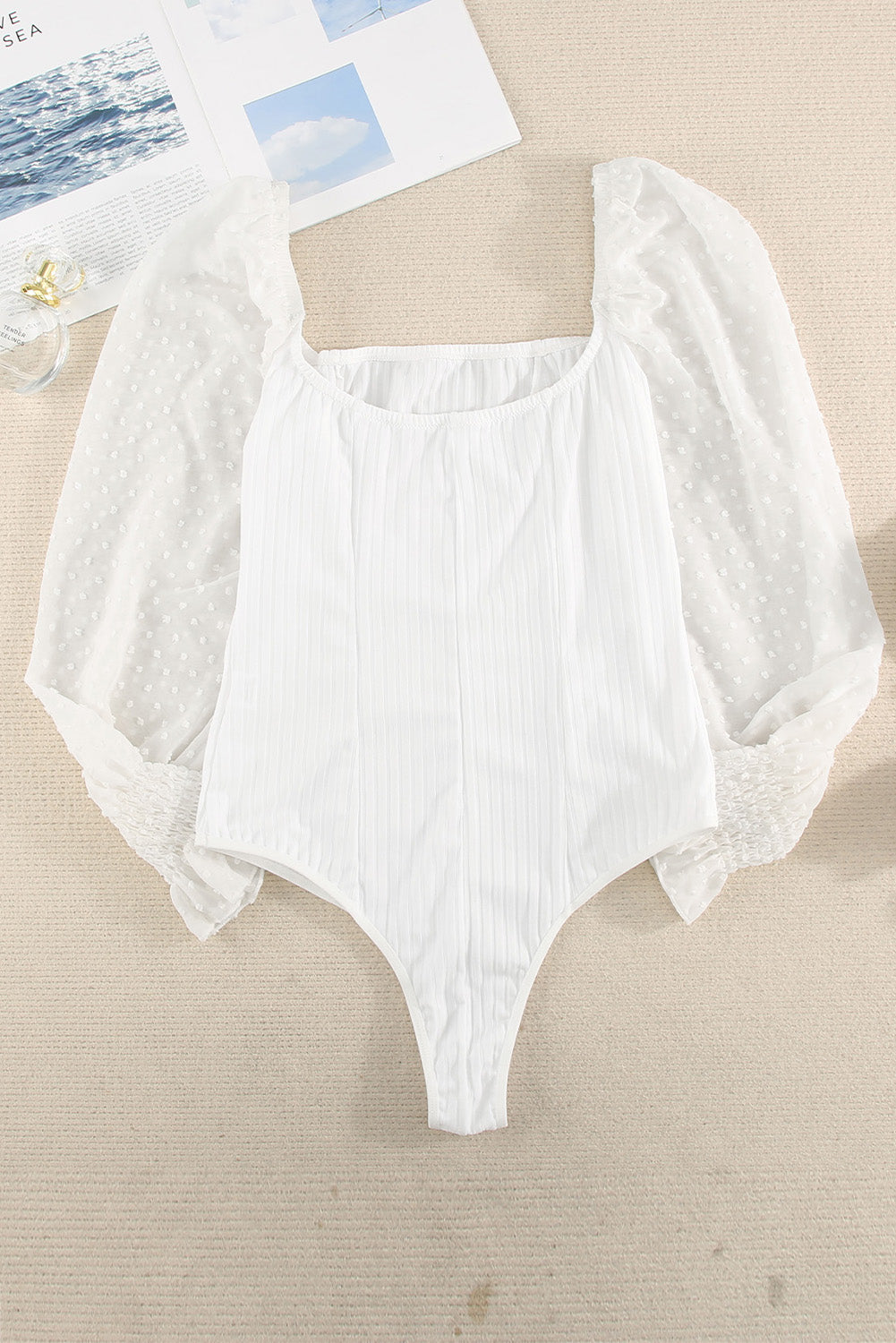 White Casual Solid Swiss Dot Ribbed Puff Sleeve BodysuitMaterial:95%Polyester+5%Elastane
Look super sweet for date night in our swiss dot bodysuit
This ribbed knit bodysuit features contrasted swiss dot bi