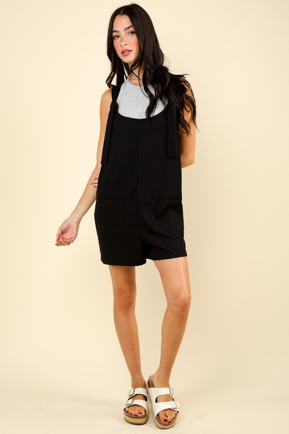 VERY J Tie Shoulder Front Pocket RomperThe Solid Casual Knit Romper is a chic and comfortable choice for any casual occasion. This romper features front patch pockets for added convenience and a trendy to