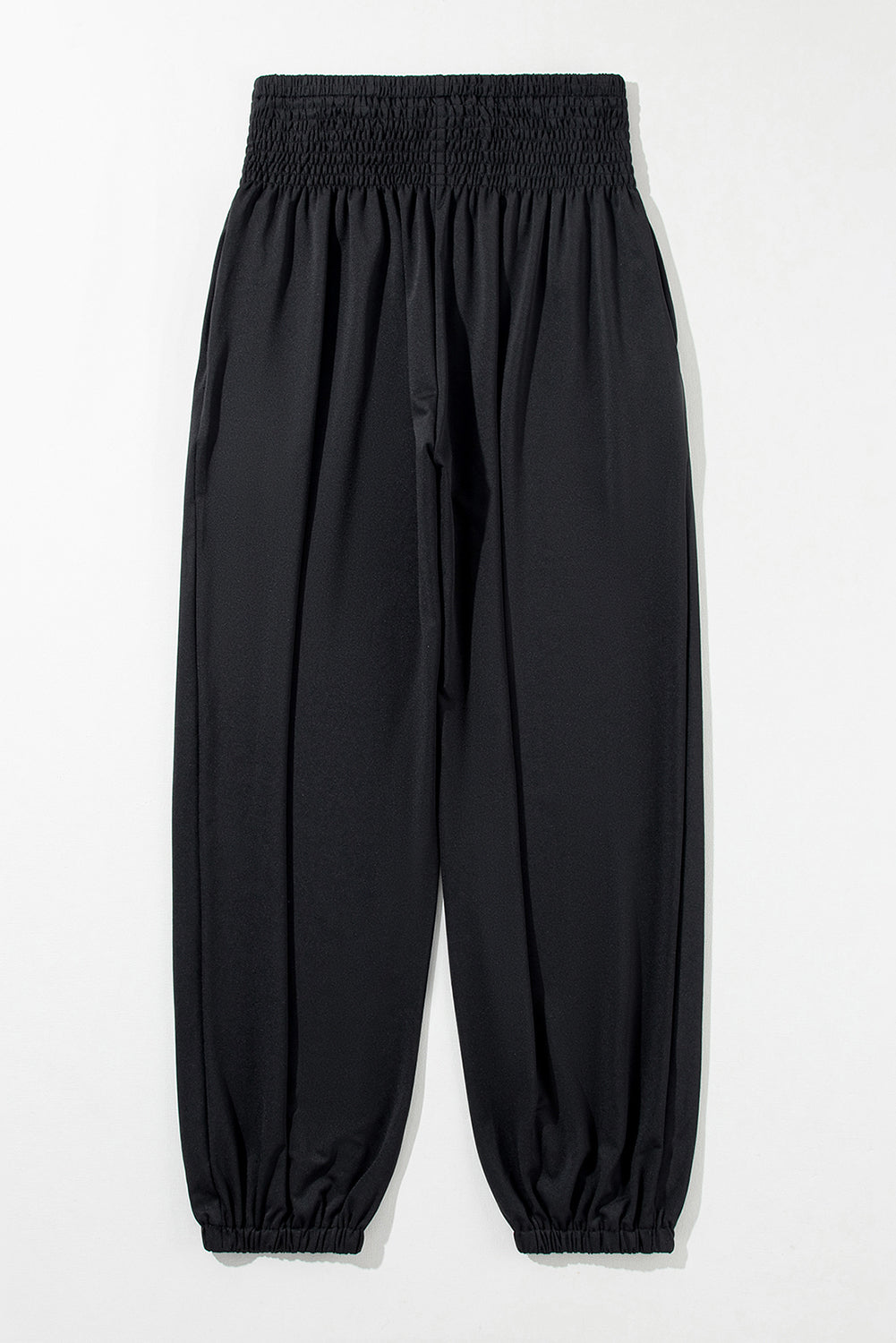 Black Pocketed Smocked High Waist JoggersMaterial:95%Polyester+5%Elastane
These jogger pants are very cozy to wear with 95%Polyester+5%Elastane made
The smocked design adds a stylish touch a