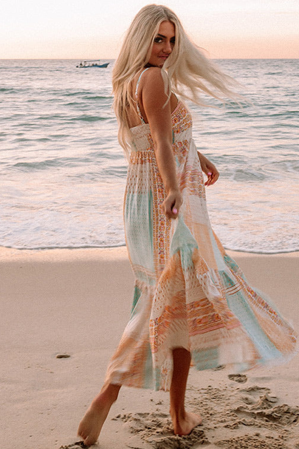 Multicolor Boho Patchwork Print Square Neck SundressMaterial:100%Polyester
Bohemian-inspired sundress with a colorful patchwork print and square neckline.
Flowy and comfortable midi dress with a loose