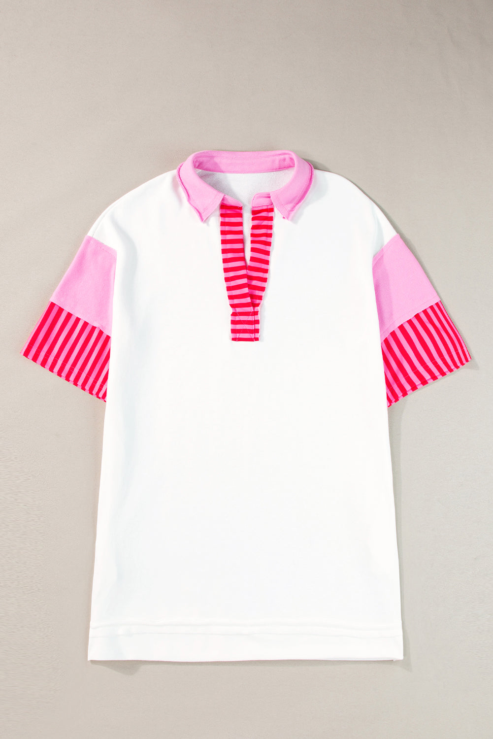 Pink Stripe Colorblock Sleeve Collared Mini DressMaterial:65%Polyester+35%Cotton
• The combination of pink and stripes adds a fun and trendy touch to your outfit.
• Embrace the relaxed vibes with the drop sleeve