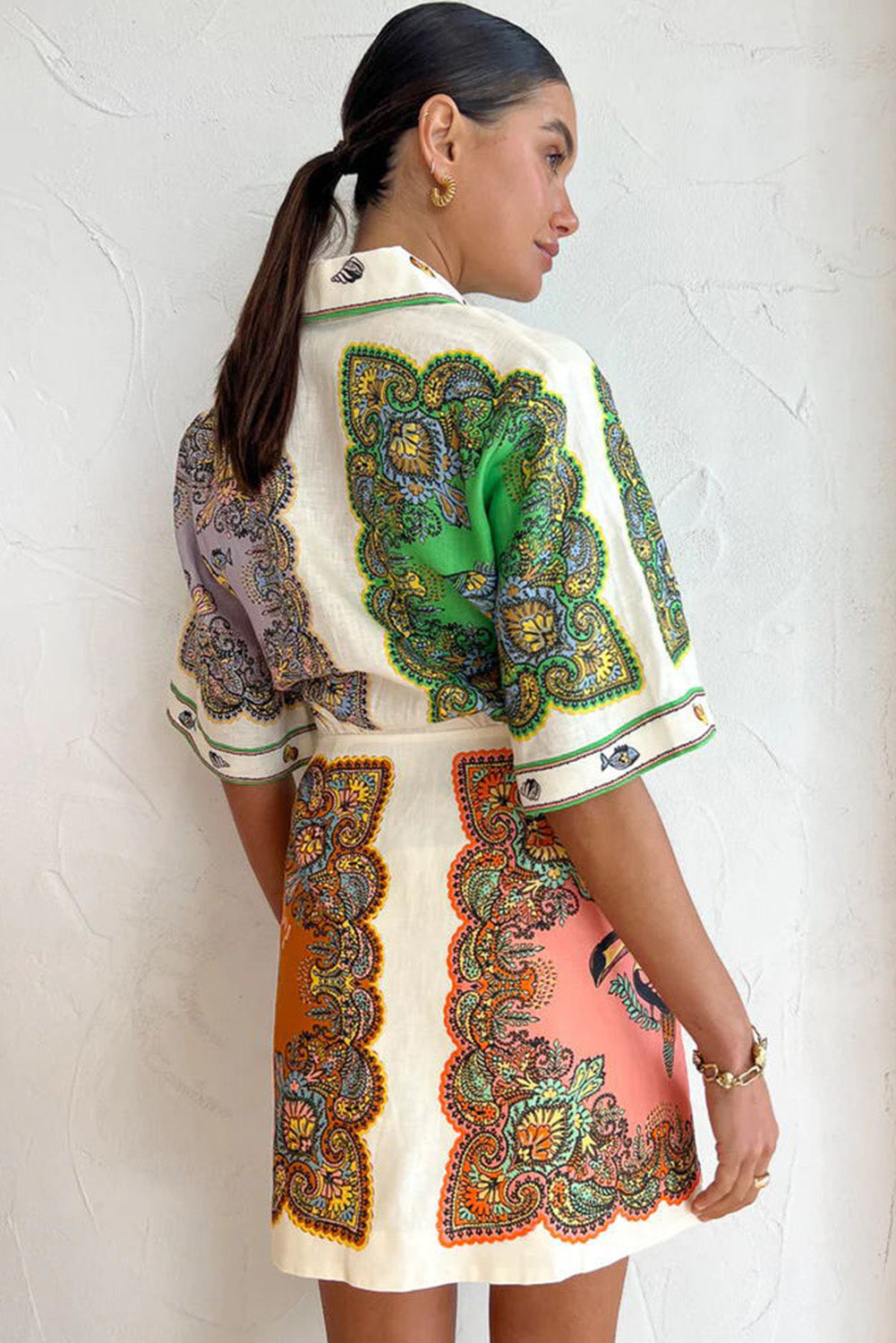 Beige Ethnic Printed Color Block Button Up Short Dress• Embrace a fusion of ethnic prints and color blocking in this short dress, perfect for a casual yet stylish look.
• The short sleeves and collar add a touch of sop