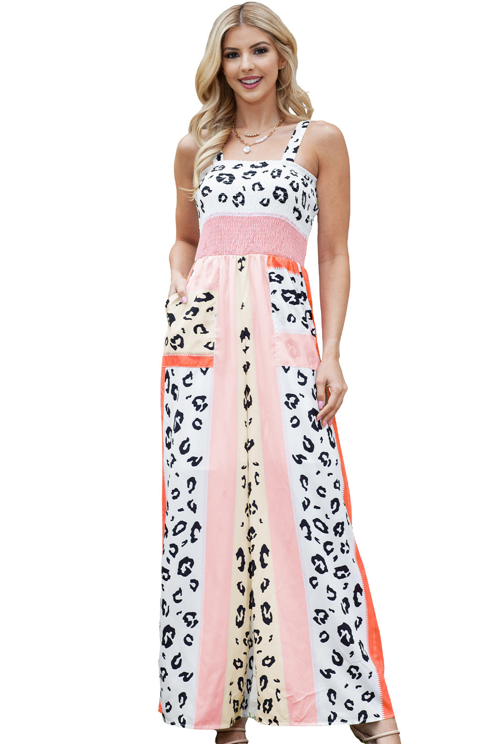 Pink Leopard Color Block Patchwork Strap JumpsuitMaterial:100%Polyester
The pink leopard color block mix print design creates a trendy and playful look, perfect for making a fashion statement.
The