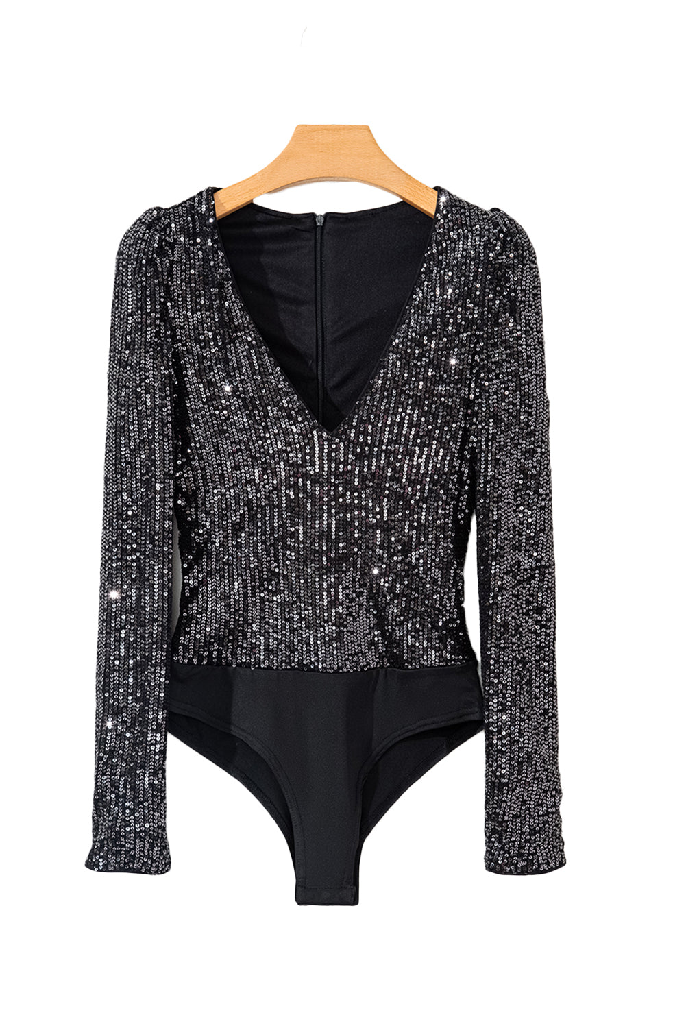 Black Sequin V Neck Zipped Long Sleeve BodysuitMaterial:95%POLYESTER+5%ELASTANE
Prepare to be mesmerized by this stunning sequin bodysuit that's bound to turn heads.
With its sexy v-neck, lo