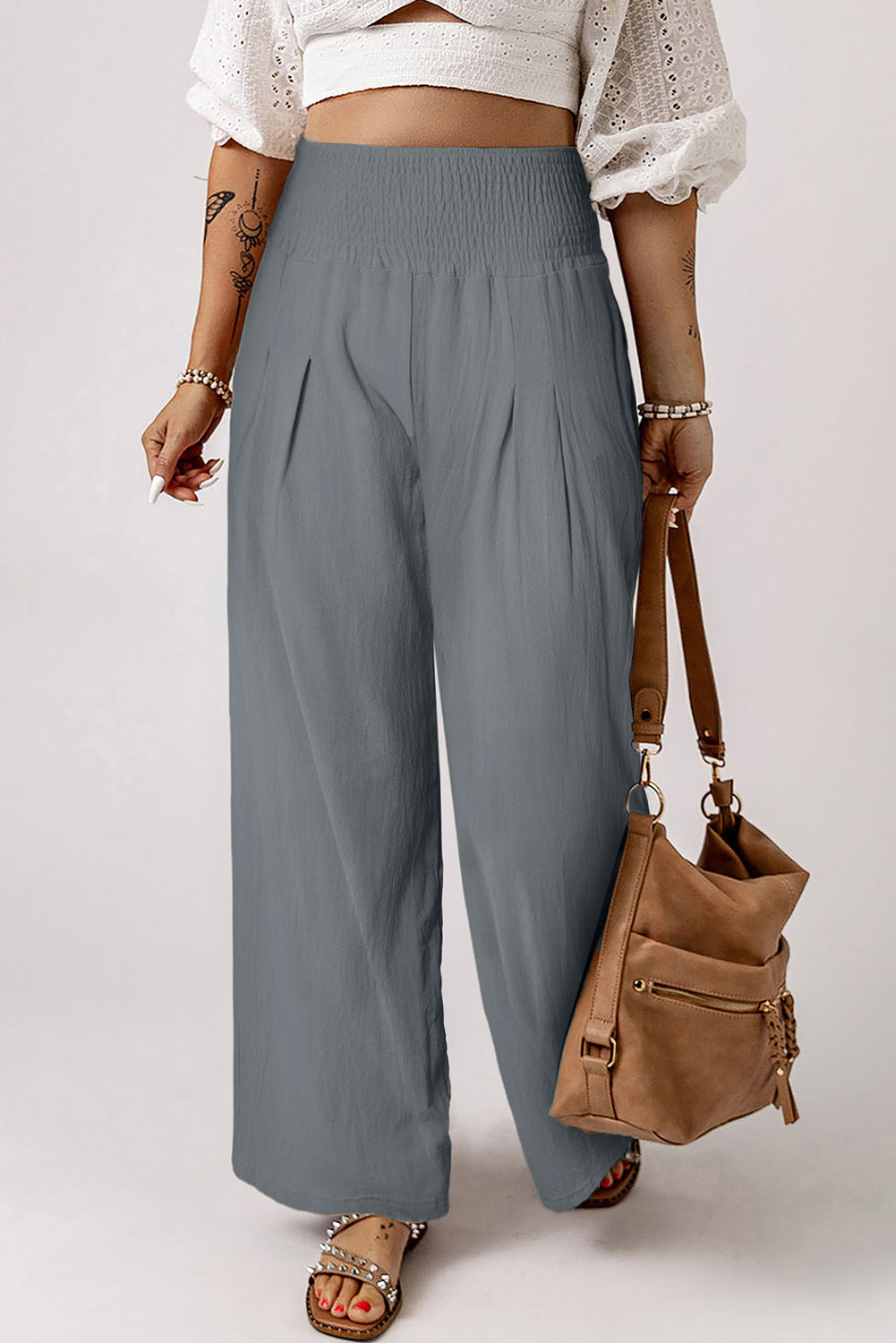 Black Smocked Wide Waistband High Waist Wide Leg PantsMaterial:65%COTTON+35%POLYESTER
Flattering smocked waistband cinches at the
waist for a lovely silhouette
High waist design elongates legs for a
st