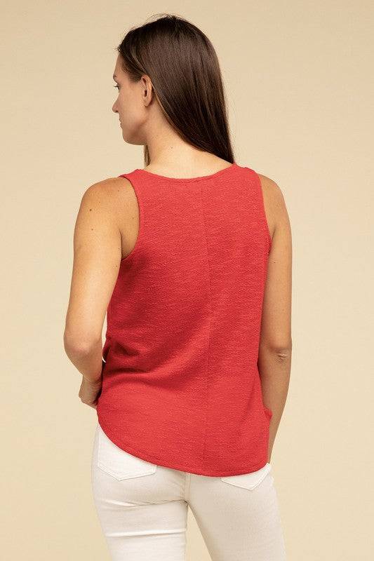 V Neck Sleeveless Cami TopThe V Neck Sleeveless Cami Top is a chic and versatile addition to any wardrobe. Featuring a flattering V neckline and a sleeveless design, this cami top is perfect 