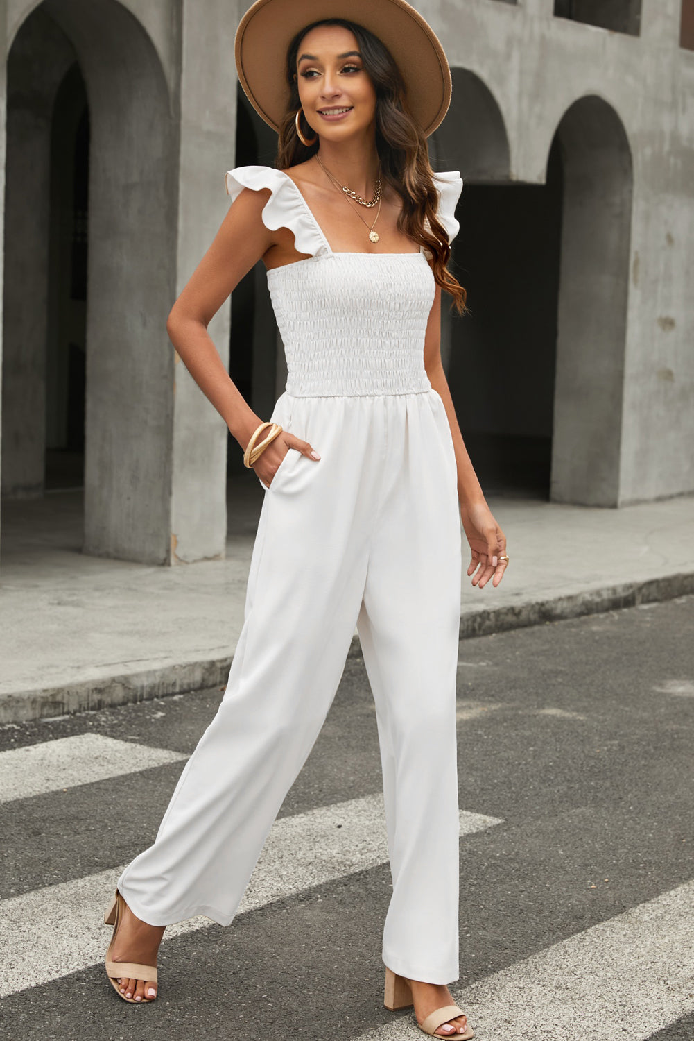 Apricot Smocked Ruffle Strap Pocket Wide Leg JumpsuitMaterial:100%Polyester



		This plain jumpsuit is sexy yet graceful with a flattering silhouette
	
	
		Flutter sleeves, square neck, smocked bodice and wide le