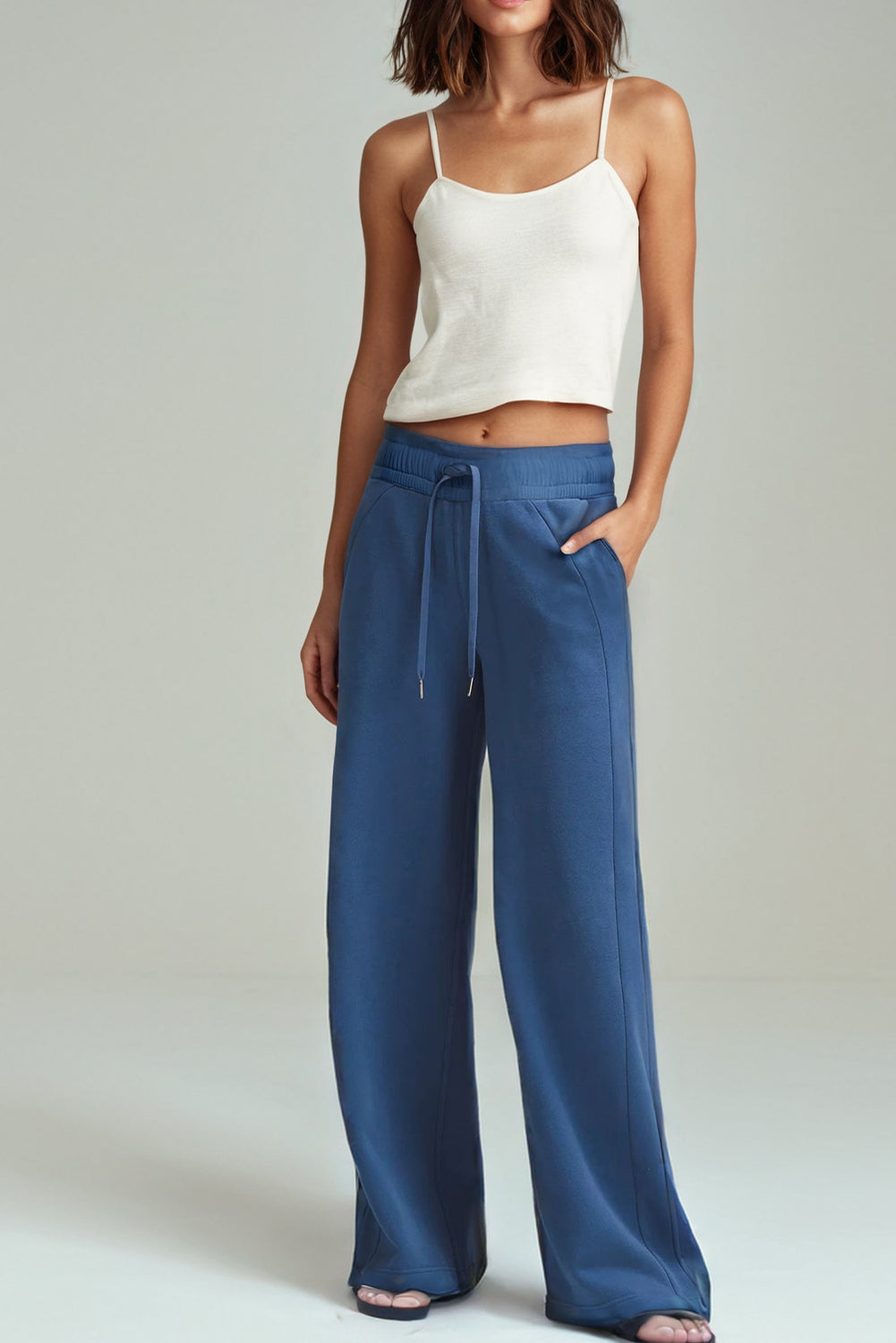 Sail Blue Drawstring High Waist Wide Leg Pocketed PantsMaterial:65%Polyester+35%Cotton

• Crafted from a luxurious sail blue fabric, these drawstring high waist pants offer a unique touch to your casual wardrobe.
• The