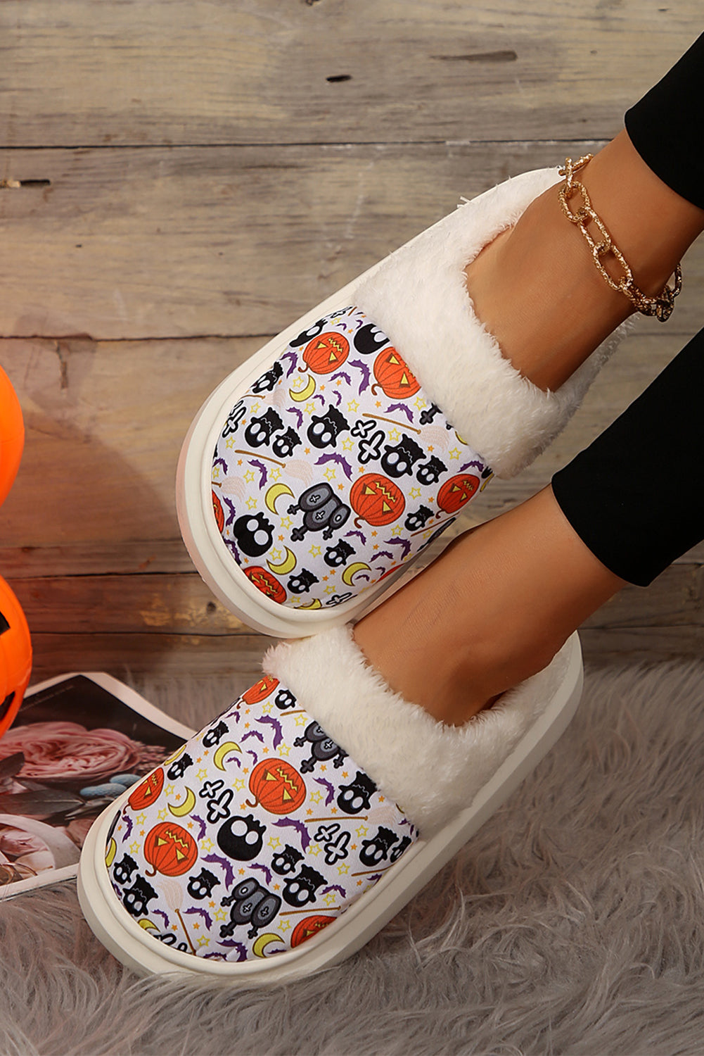 White Halloween Pumpkin Ghost Print Plush Home Slippers• Luxuriously soft and cozy, these plush home slippers feature a charming Halloween pumpkin ghost print, perfect for adding a festive touch to your loungewear.
• Th