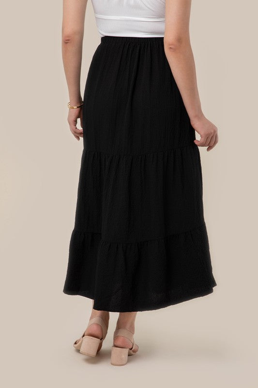 Tiered maxi skirt- Tiered maxi skirt- Pattern type : solid- Stretch : stretch- Sheer : Beige - lined and no see through / Black - not lined, but not very sheer- Care instruction : ma