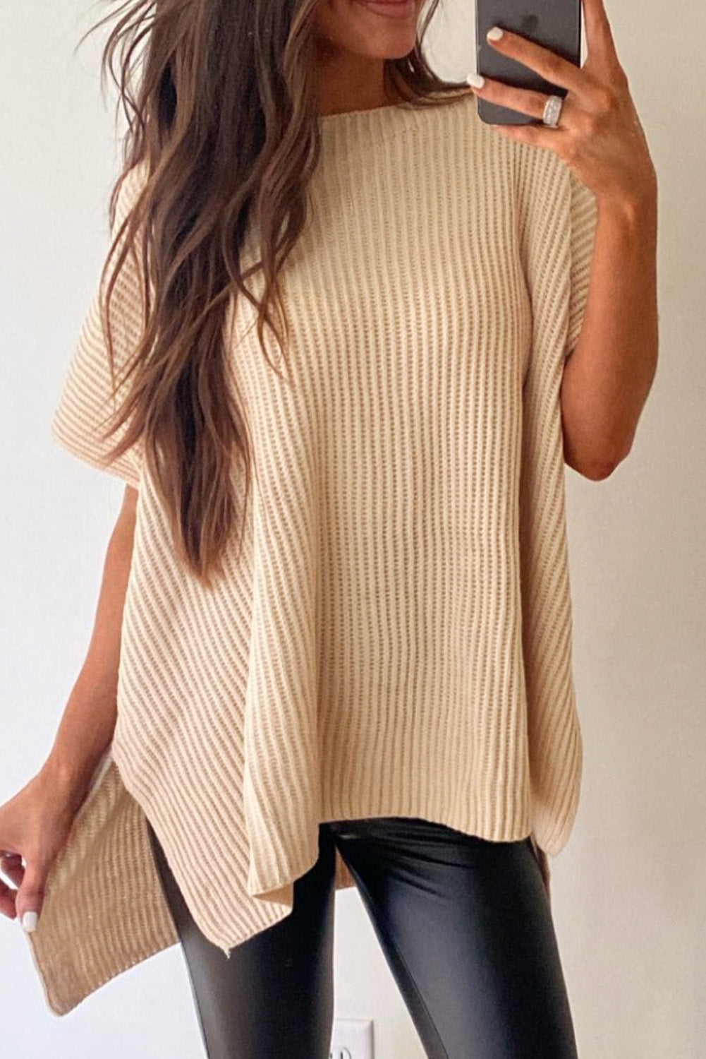 Apricot Side Slit Short Sleeve Oversized SweaterMaterial:55%Acrylic+45%Cotton



		The sweater is a comfortable and chic addition to your wardrobe. Made from breathable, lightweight, and stretchy knitted fabric,