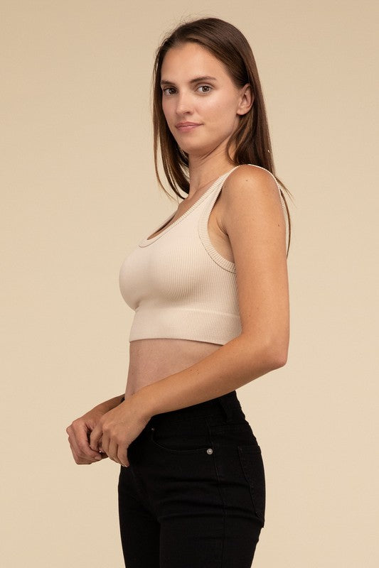 Ribbed Seamless Crop TopElevate your summer essentials with our Ribbed Seamless Crop Top, a versatile piece perfect for layering or wearing solo. Crafted with comfort in mind, it boasts a f