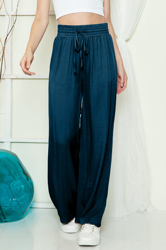 Blue Casual Drawstring Shirred Elastic Waist Wide Leg PantsMaterial:65%Viscose+35%Polyester



		These wide leg pants
are casual and comfy with a loose fit style
	
	
		The smocked waist
design is fashionable and very 