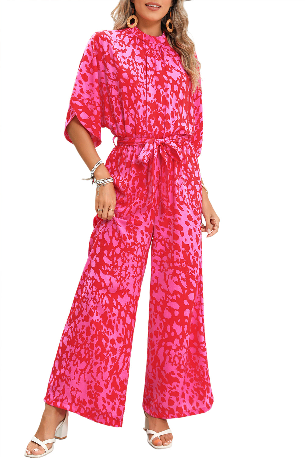 Rose Leopard Print Tulip Sleeve Belted Wide Leg JumpsuitMaterial:100%Polyester



		The jumpsuit features a trendy leopard print pattern, adding a bold and fashionable touch to your wardrobe.
	
	
		With its flounce s