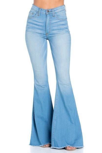 Logan Bell Bottom In Light Blue Inseam 30Full Length 5 Pocket Flare Jean features frayed hem, Light wash, whisker wash detail, Stretch denim, front and back pockets, 30" Inseam, Made in USA
Style: high rise