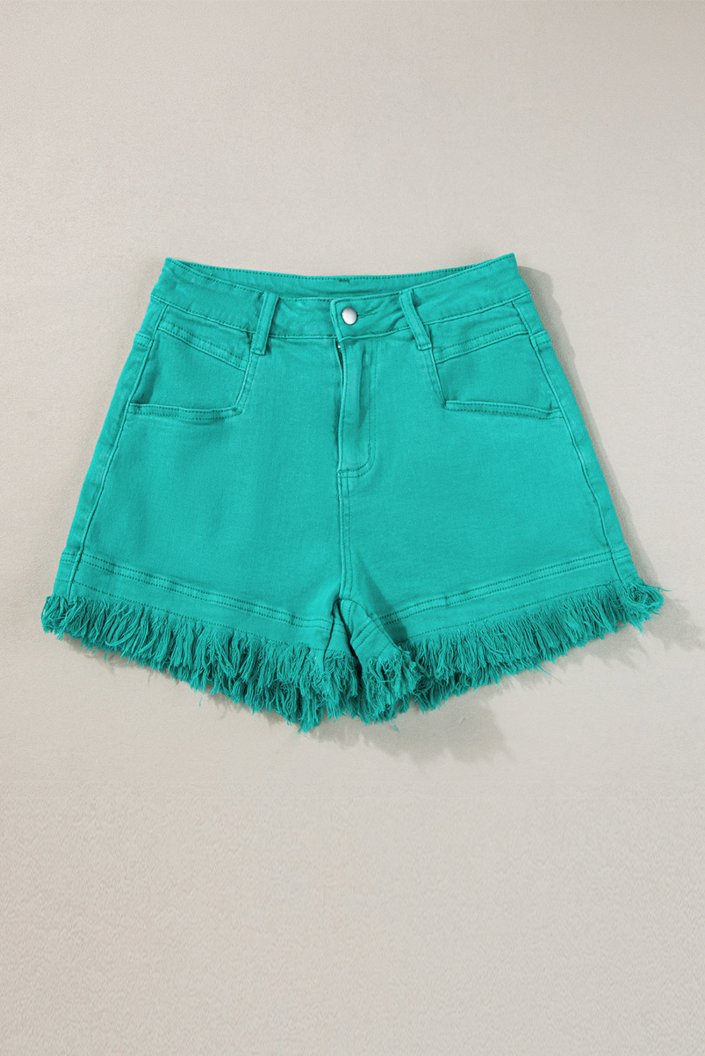 Turquoise Raw Hem Mid Rise Denim ShortsMaterial:98%Cotton+2%Elastane



		Discover a level of style that surpasses expectations with these denim shorts, offering a chic and fashionable look that goes be