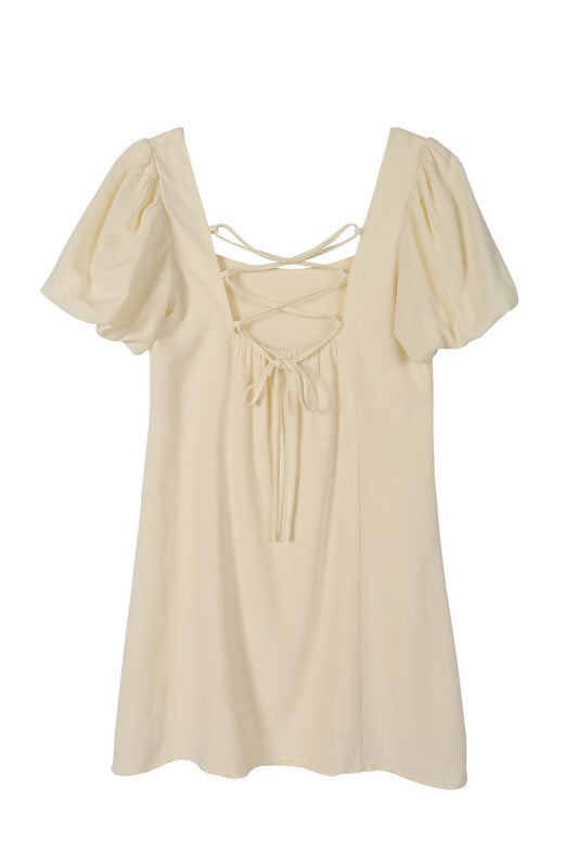 SS back strap dress - solid color*Scoop neck puff sleeve cream with back strap dress*Pattern type : solid*Neck line : square neck*Sleeve type : puff sleeves*Sleeve length : short sleeves*Stretch : n