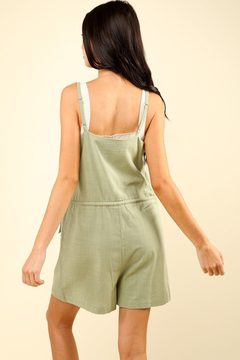 VERY J Half Button Drawstring Sleeveless RomperStep out in style with this chic Half Button Drawstring Sleeveless Romper, perfect for a casual day out or a fun night with friends. The half-button design adds a to