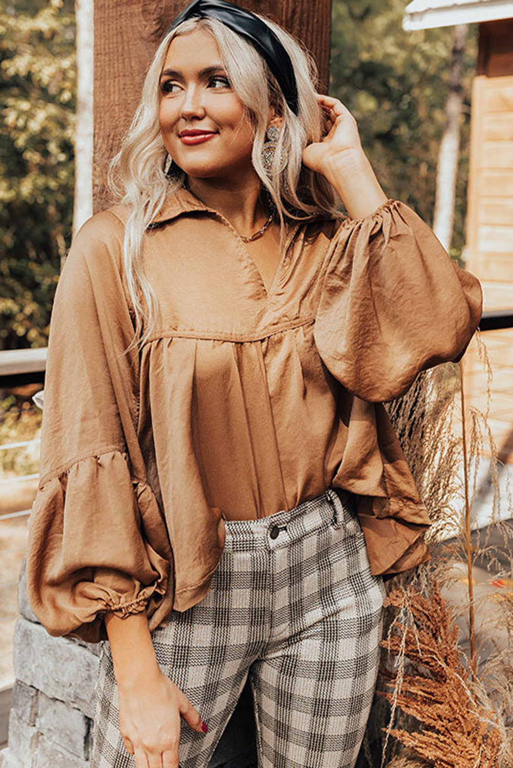 Brown Solid Color Lantern Sleeve Collared Boho TopMaterial:100%Polyester



		Made from high-quality materials for durability and comfort.
	
	
		It features 3/4 lantern sleeves and a collared neckline.
	
	
	