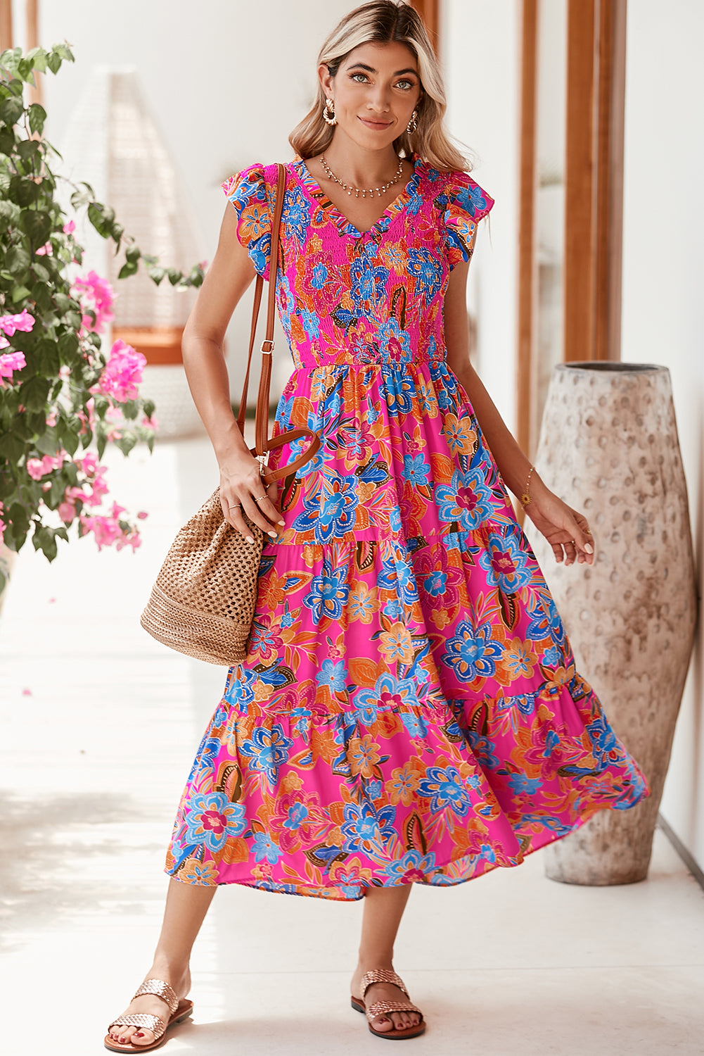 Dark Blue Boho Floral V Neck Ruffle Tiered Long DressMaterial:100%Polyester



		This flirty and fun dress is designed to captivate attention with its stunning floral print. 
	
	
		The smocked bodice and tiered A-