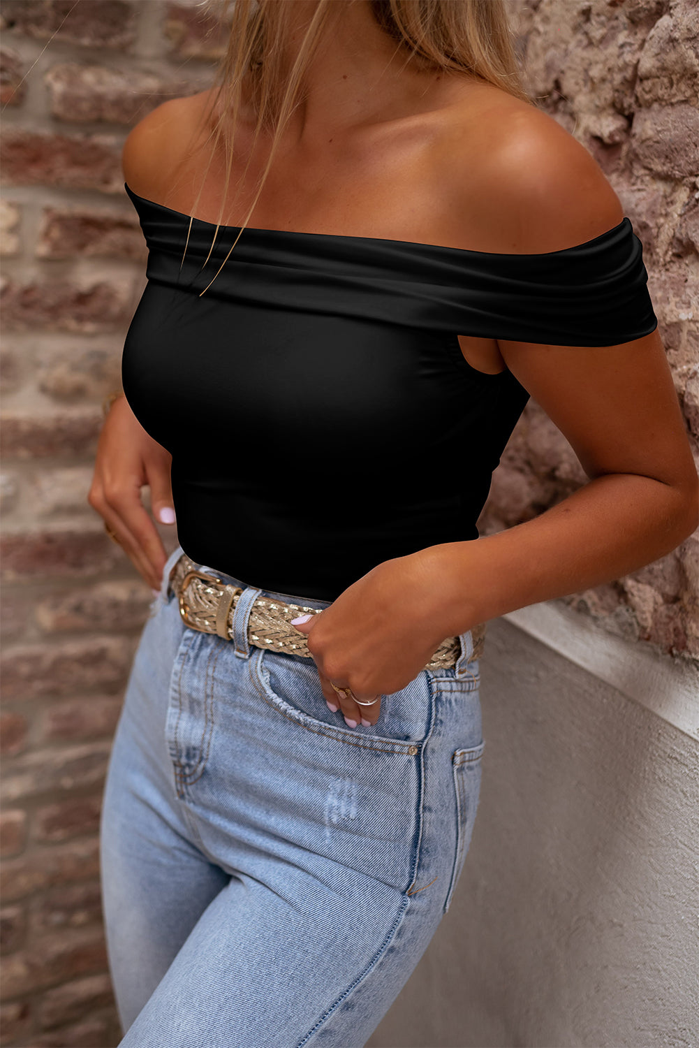 Black Solid Color Folded Off Shoulder Slim BlouseMaterial:92%Polyester+8%Elastane



		This trendy and flattering slim top is crafted to provide a fashionable and modern look, making it a versatile choice for var