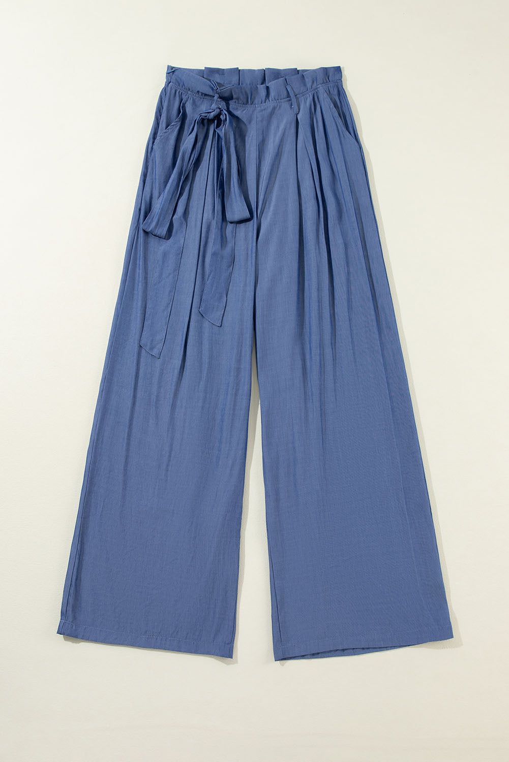 Wild Wind Belted Frill Waist Wide Leg Loose PantsMaterial:55%Viscose+45%Polyester



		Crafted with a belted frill waist, the pants offer a chic and trendy look suitable for any casual or semi-formal occasion.
	