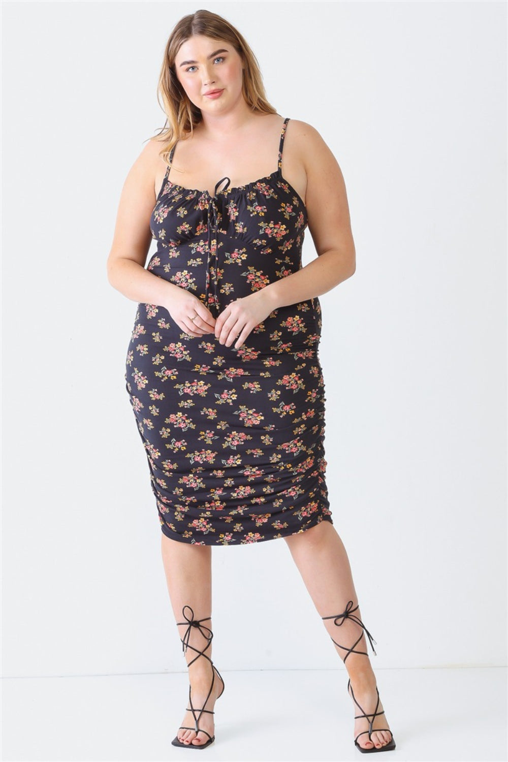 Blue Leopard Plus Size Ruched Floral Square Neck Cami DressRuched Floral Square Neck Cami Dress is a trendy and feminine piece that effortlessly combines style and comfort. The square neckline adds a chic touch, while the ru