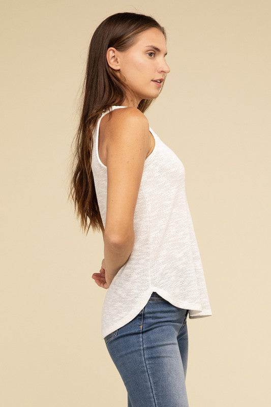 V Neck Sleeveless Cami TopThe V Neck Sleeveless Cami Top is a chic and versatile addition to any wardrobe. Featuring a flattering V neckline and a sleeveless design, this cami top is perfect 