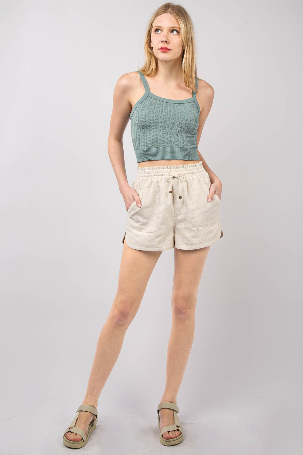 VERY J Drawstring Elastic Waist Linen ShortsStay cool and comfortable in these Elastic Waist Solid Linen Shorts featuring side pockets and a round hem for added style. These Cool Comfort Eco-Friendly Recycling