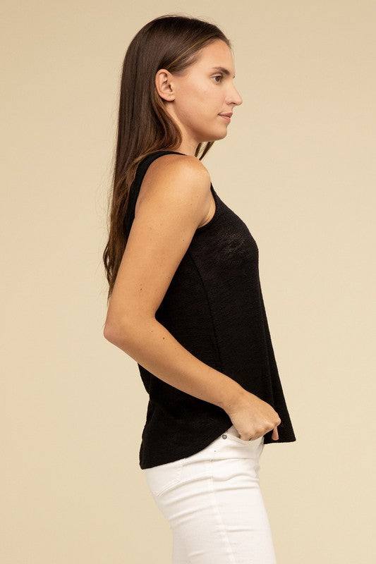 V Neck Sleeveless Cami TopThe V Neck Sleeveless Cami Top is a chic and versatile addition to any wardrobe. Featuring a flattering V neckline and a sleeveless design, this cami top is perfect 