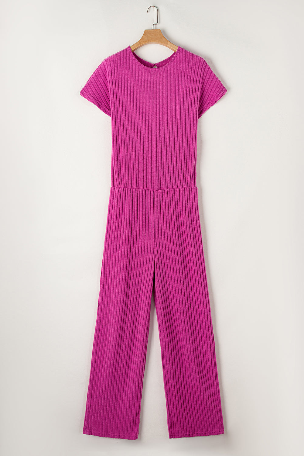 Grass Green Solid Color Ribbed Short Sleeve Wide Leg JumpsuitMaterial:85%Polyester+10%Viscose+5%Elastane



		The jumpsuit is a versatile and trendy one-piece outfit, featuring a solid color design that offers a sleek and mi