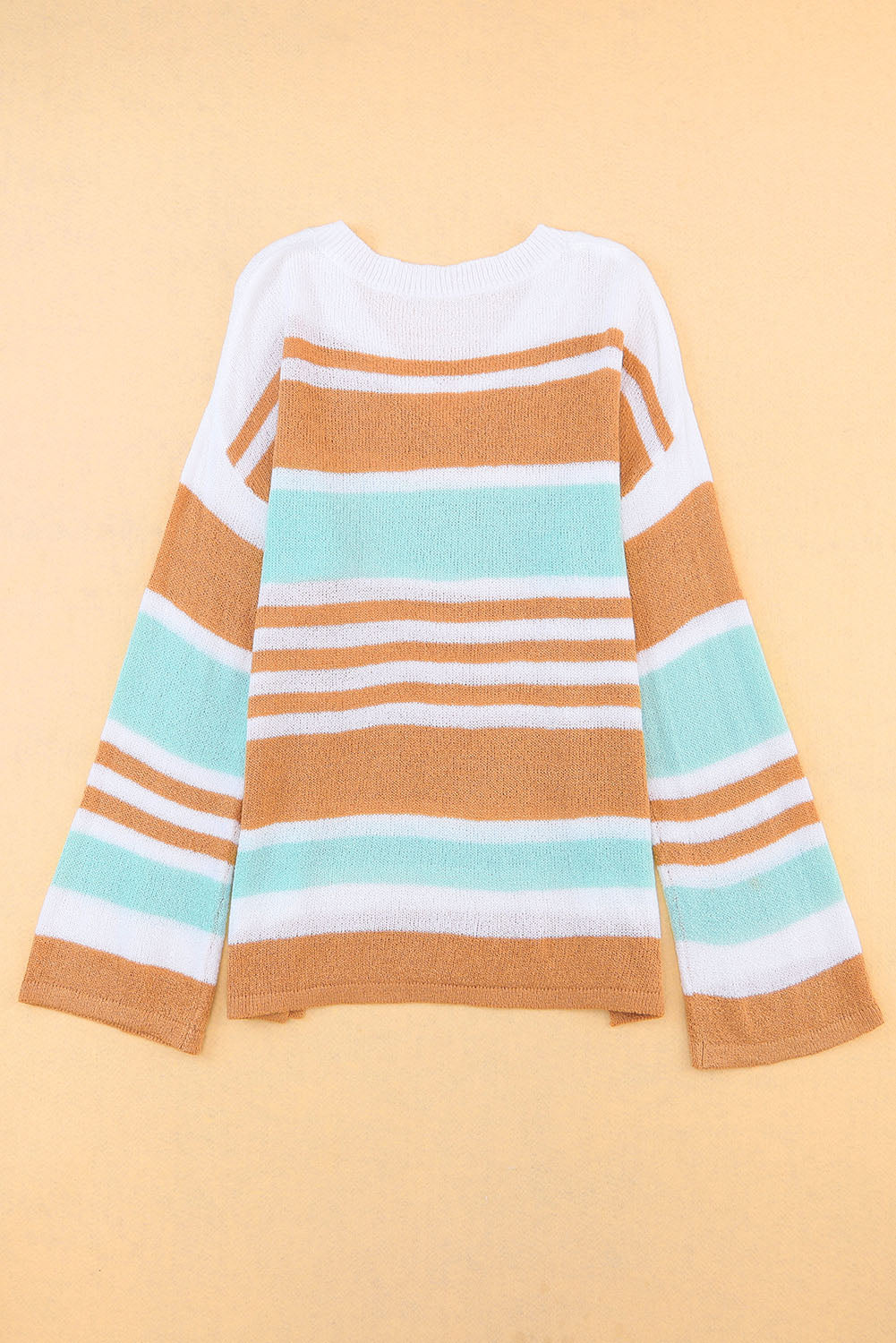 Multicolor Colorblock Stripe V Neck Split SweaterMaterial:100%Acrylic


	


		The V-neckline and split hem add a touch of elegance, while the colorblock design adds a modern and trendy twist.
	
	
		Add a pop