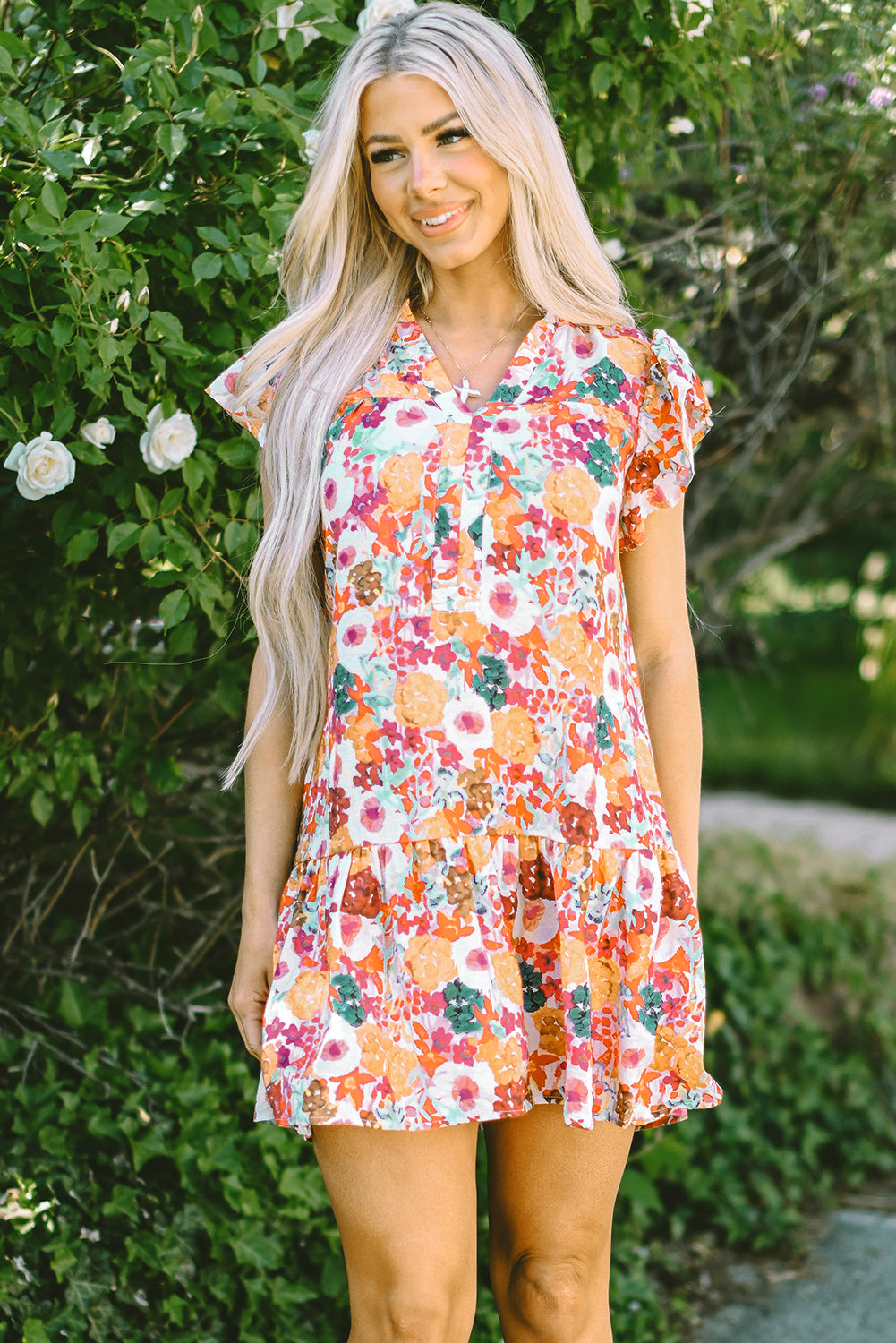 Purple Floral Print Split Neck Ruffle Mini DressMaterial:81%Viscose+19%Polyamide

• Embrace an enchanting aura with the mesmerizing purple floral print that adorns this boho-chic mini dress, perfect for garden pa