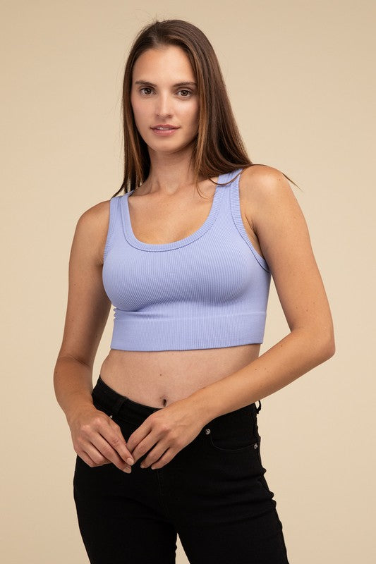 Ribbed Seamless Crop TopElevate your summer essentials with our Ribbed Seamless Crop Top, a versatile piece perfect for layering or wearing solo. Crafted with comfort in mind, it boasts a f