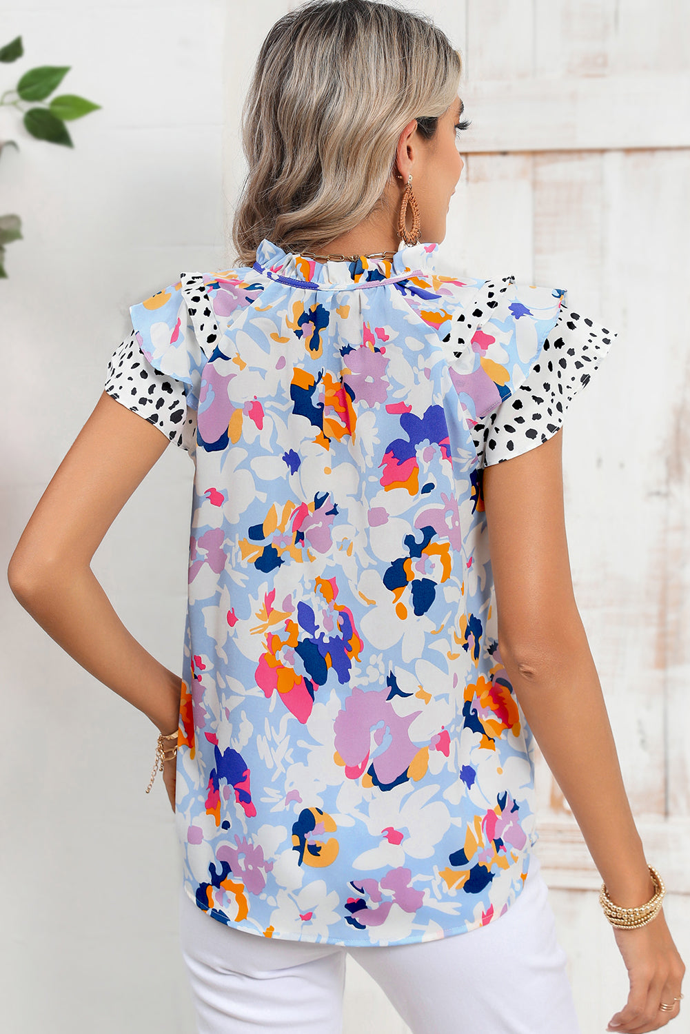 Light Blue Floral Print Ruffle Flutter Sleeve V Neck BlouseMaterial:100%Polyester



		Blouse with vibrant and bold floral print a pretty outlook
	
	
		Feminine ruffled flutter sleeves add a touch of elegance
	
	
		V