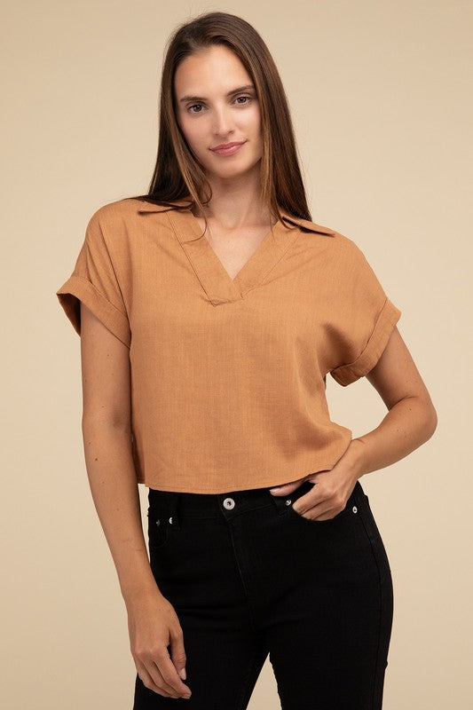 Always a Delight Short Sleeve Linen TopExperience everyday elegance with our Always a Delight Short Sleeve Linen Top. This top exudes understated sophistication with its collared V-neck and cuffed short s