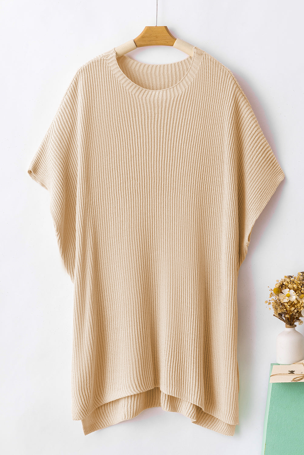 Apricot Side Slit Short Sleeve Oversized SweaterMaterial:55%Acrylic+45%Cotton



		The sweater is a comfortable and chic addition to your wardrobe. Made from breathable, lightweight, and stretchy knitted fabric,