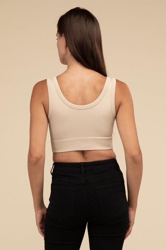 Ribbed Seamless Crop TopElevate your summer essentials with our Ribbed Seamless Crop Top, a versatile piece perfect for layering or wearing solo. Crafted with comfort in mind, it boasts a f