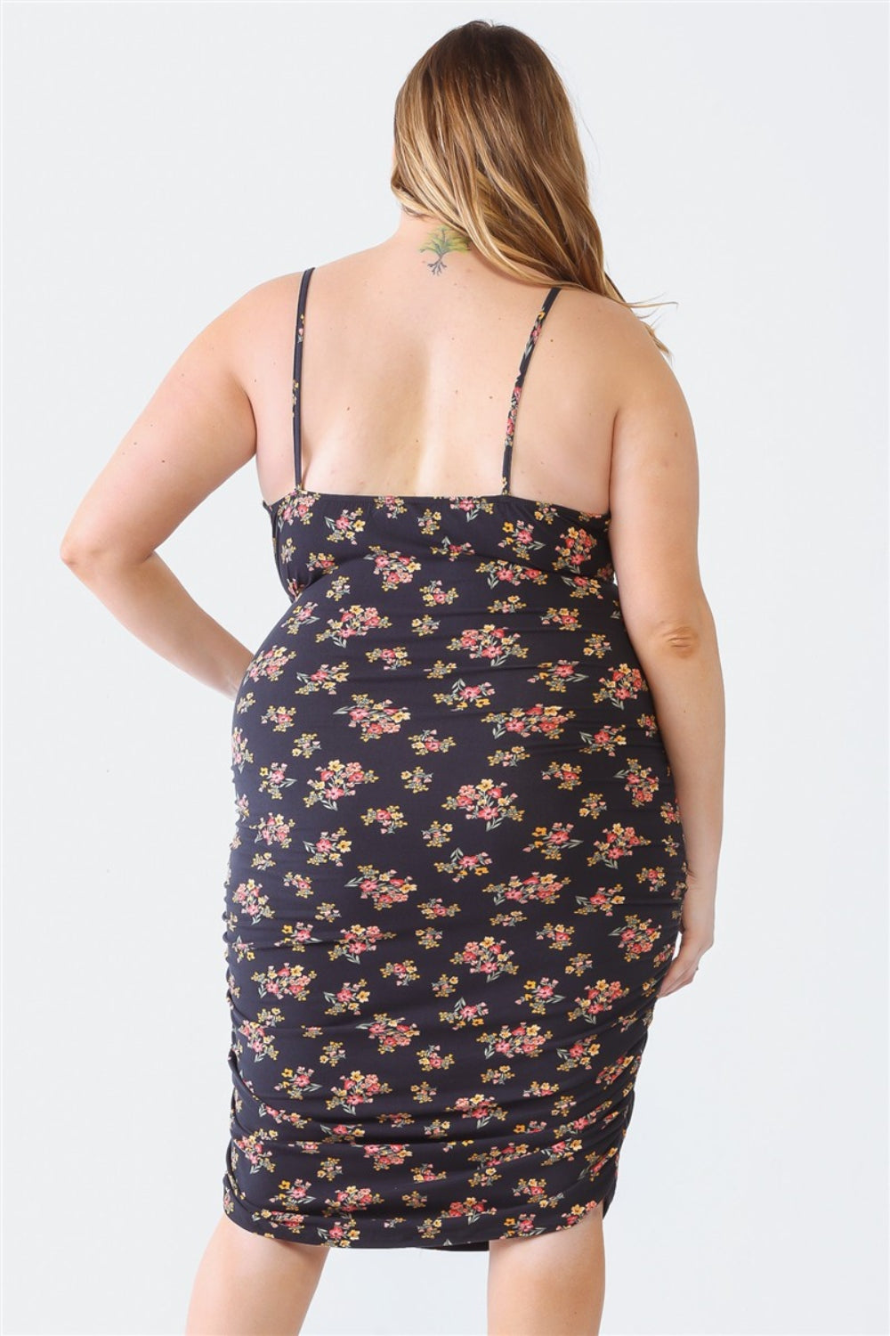 Blue Leopard Plus Size Ruched Floral Square Neck Cami DressRuched Floral Square Neck Cami Dress is a trendy and feminine piece that effortlessly combines style and comfort. The square neckline adds a chic touch, while the ru