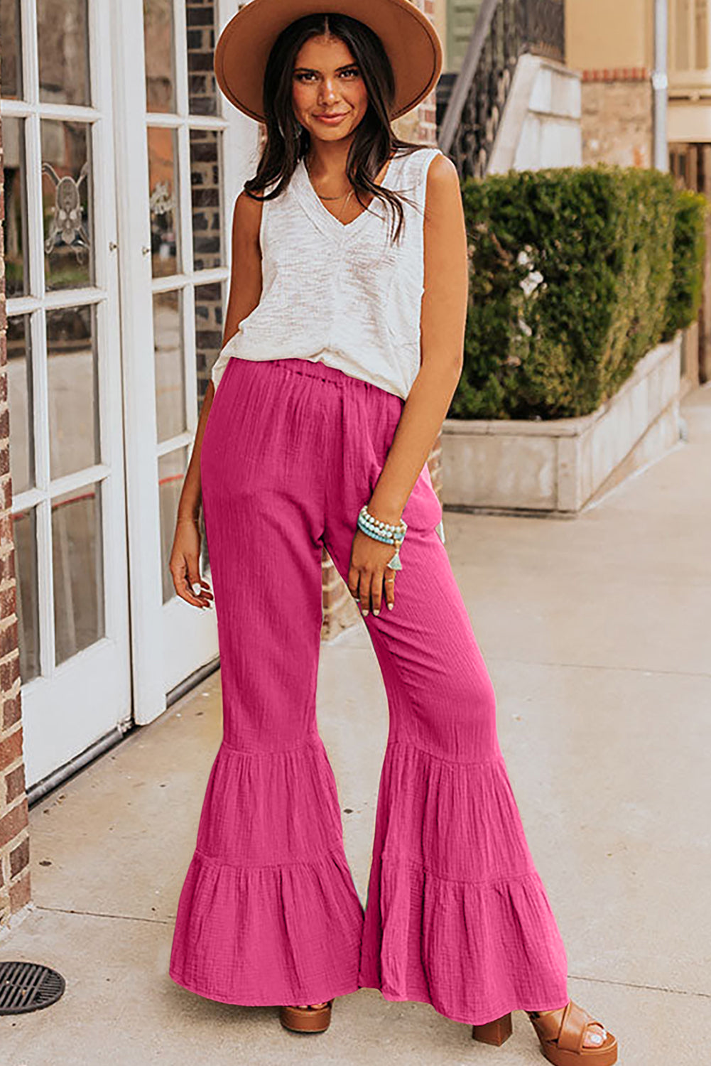 Black Plain Cotton Tiered Ruffle Flare High Waisted PantsMaterial:100%Cotton


	


		The vibrant green color adds a pop of color to your outfit, while the ruffle detailing brings a touch of femininity and flair.
	
	
