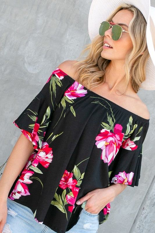 FLORAL OFF SHOULDER TOPFLORAL PRINT JERSEY ELASTICIZED OFF SHOULDER TOP- Floral off shoulder top- Elasticized off shoulder neckline- Ruffle short sleeves- Loose fit- Allover floral print j