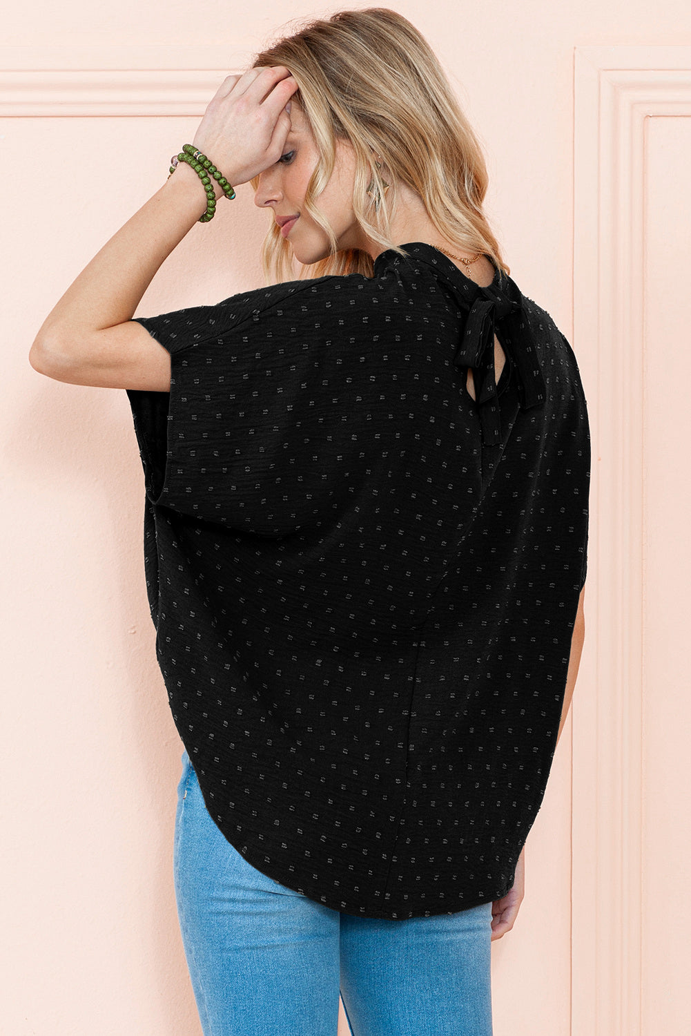 Black Swiss Dot Mock Neck Batwing Sleeve BlouseMaterial:100%Polyester



		The blouse has batwing sleeves, which are loose and draped sleeves that create a relaxed and voluminous look.
	
	
		It is designed w