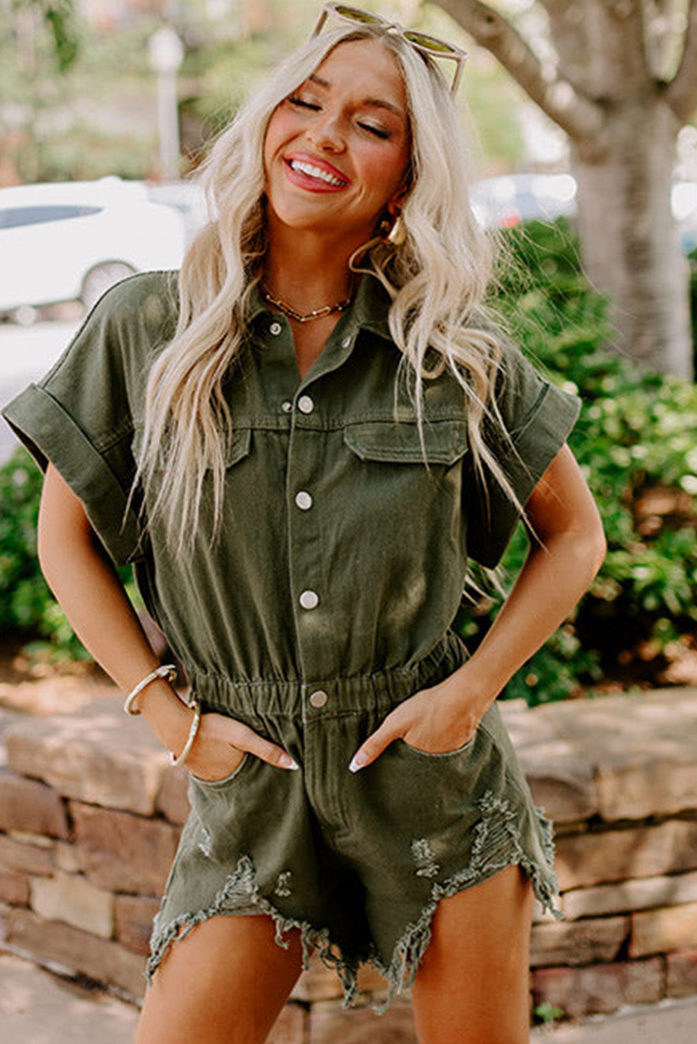 Moss Green Distressed Frayed Denim RomperMaterial:98%Cotton+2%Elastane

• This romper offers a comfortable and stretchy fit for all-day wear.
• The moss green hue brings a touch of nature-inspired charm, 