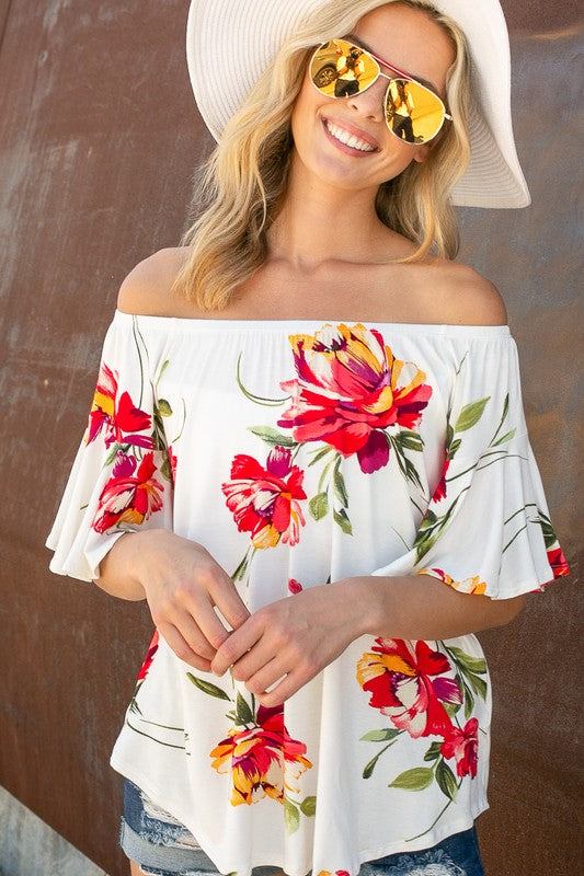 PLUS FLORAL OFF SHOULDER TOPPLUS FLORAL PRINT JERSEY ELASTICIZED OFF SHOULDER TOP- Plus Floral off shoulder top- Elasticized off shoulder neckline- Ruffle short sleeves- Loose fit- Allover flor