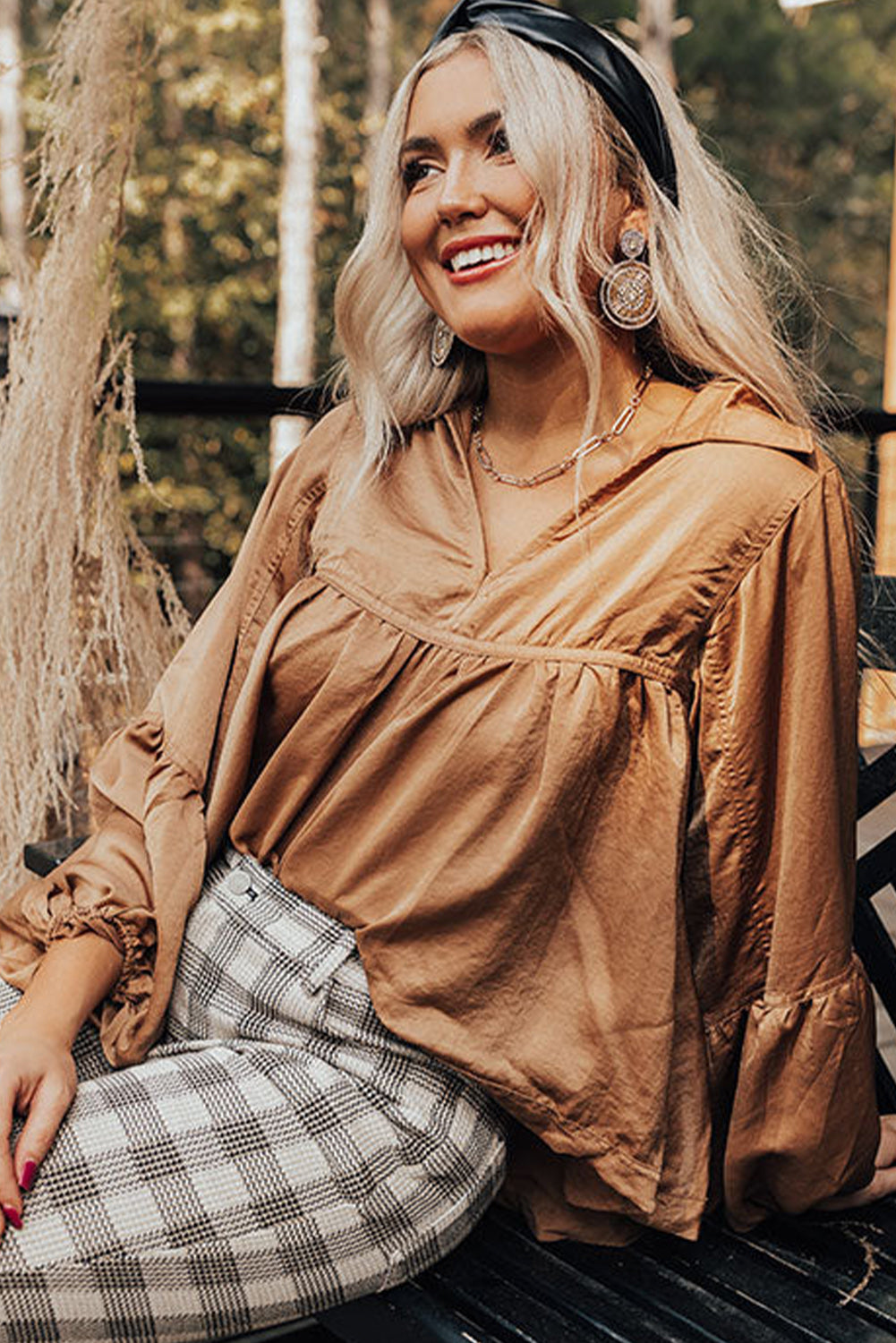 Brown Solid Color Lantern Sleeve Collared Boho TopMaterial:100%Polyester



		Made from high-quality materials for durability and comfort.
	
	
		It features 3/4 lantern sleeves and a collared neckline.
	
	
	