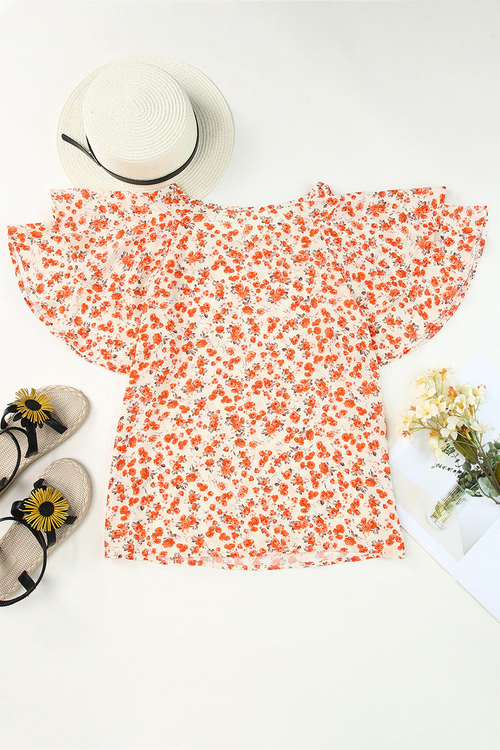 Orange Floral Tiered Flutter Sleeve BlouseMaterial:100%Polyester



		Featuring flowy flutter sleeves that add a touch of femininity to any outfit.
	
	
		Elevate your wardrobe with this stunning tiered 