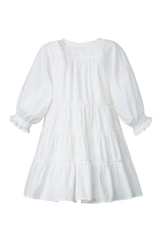 Tiered mini dress with tassel- Tiered mini dress with tassel- Pattern type : solid- Neck line : V neck- Sleeve type : raglan sleeves- Sleeve length : 3/4 sleeves- Stretch : no stretch- Sheer : l