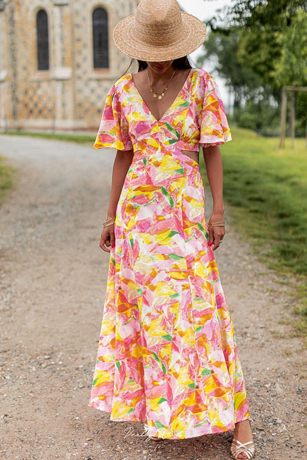 Pink Flutter Sleeve Cut-out Bohemian Floral Maxi DressMaterial:100%Polyester



		Made from a lightweight and breathable fabric, this maxi dress features flutter sleeves that create a graceful and flowy look, perfect 