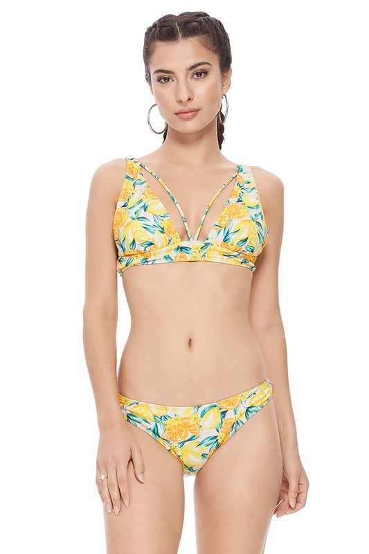 TEXTURED LEMON PRINT BIKINI SETLemon print halter two piece style features strappy details in the front, removable pads, adjustable shoulder straps, hook at back, and full coverage bottom. Texture